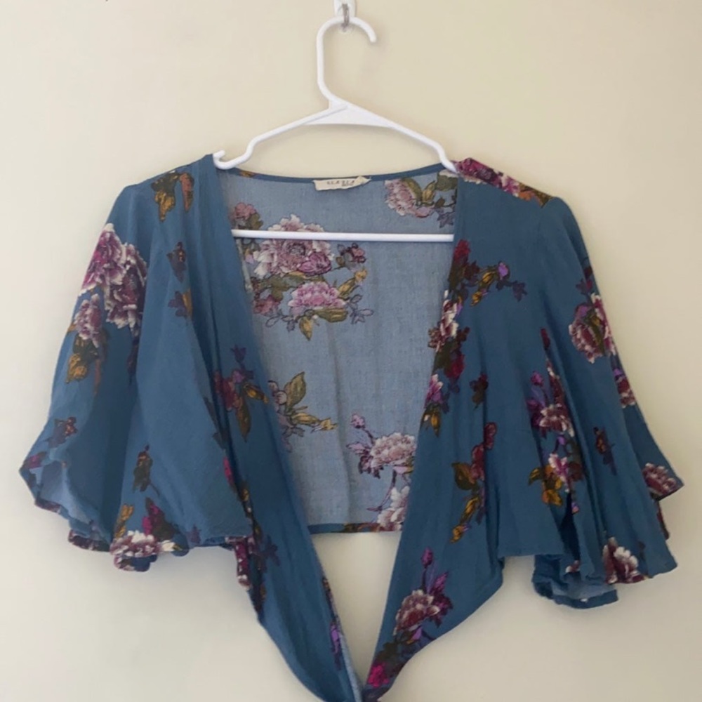 Blue floral wrap top